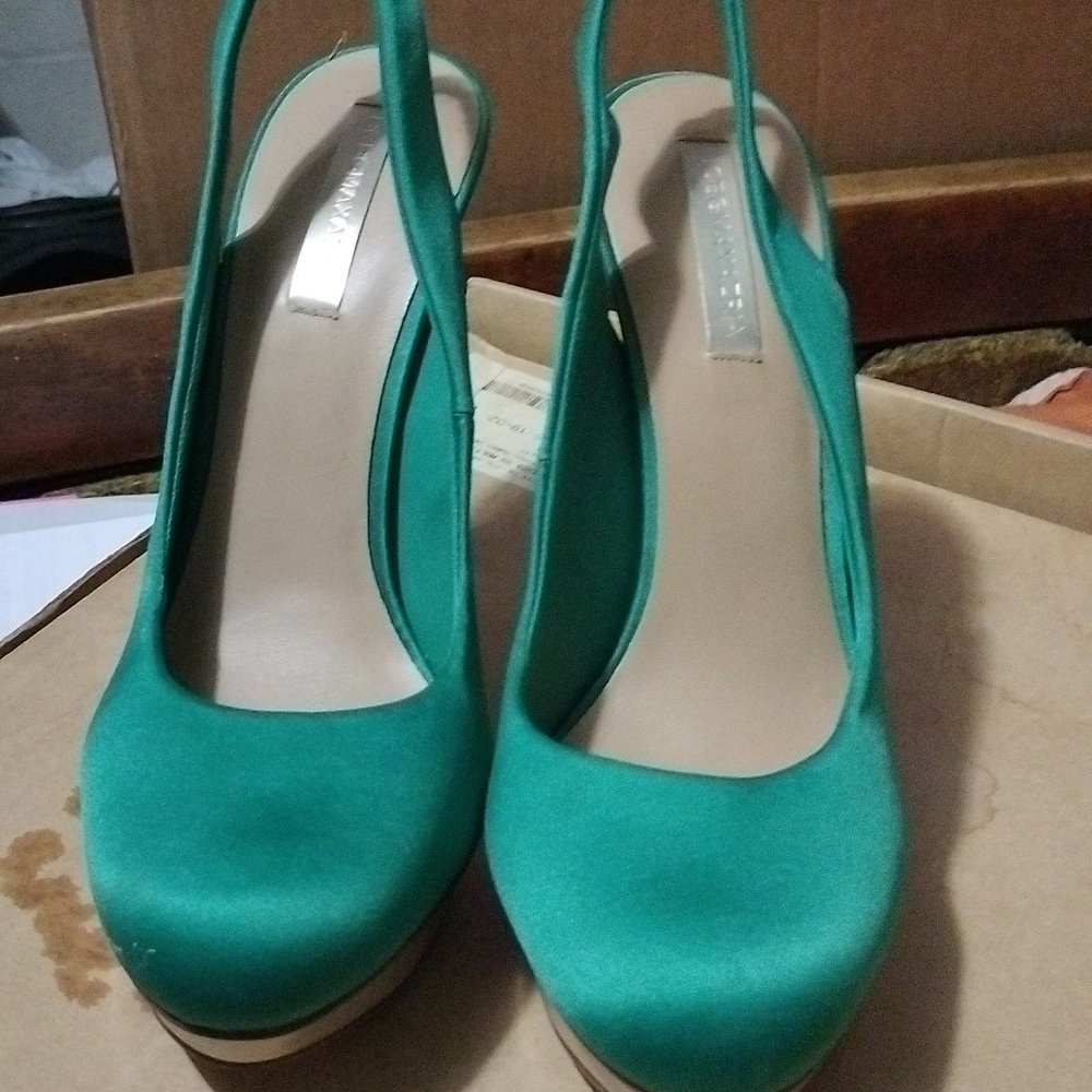 Green silk pumps